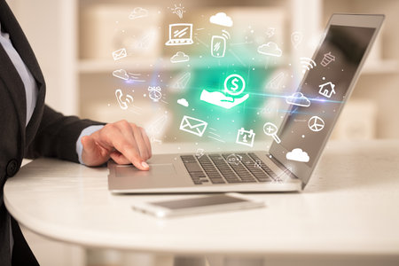 Businessman working on laptop with new business conceptの写真素材