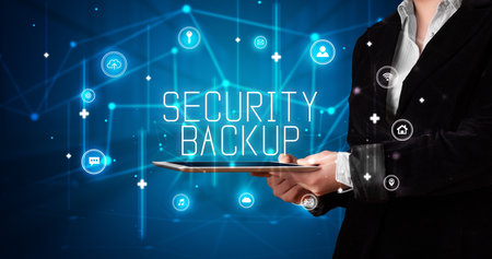 Person holding tablet, security conceptの写真素材
