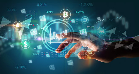 Business person hand pushing currency symbol on multimedia touch screenの写真素材