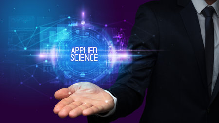 Man hand holding digital technology conceptの写真素材