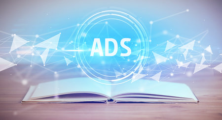 Open book with abbreviation concept conceptの写真素材