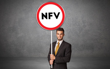 Young business person holdig traffic signの写真素材