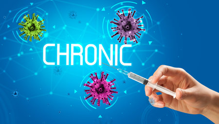 Syringe, medical injection in hand, coronavirus vaccine conceptの写真素材