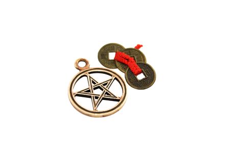 Chinese coins with red ribbon. Symbol of good luck.