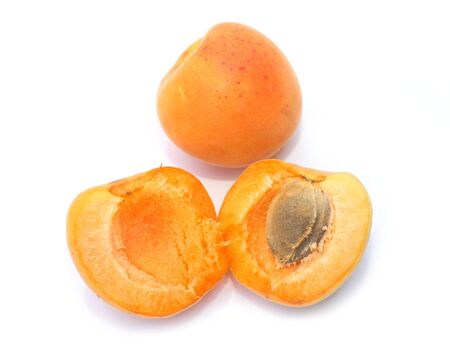 Apricot with halves on White.の写真素材