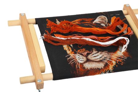 Equipment and thread for the home embroidery cross on a white backgroundの写真素材