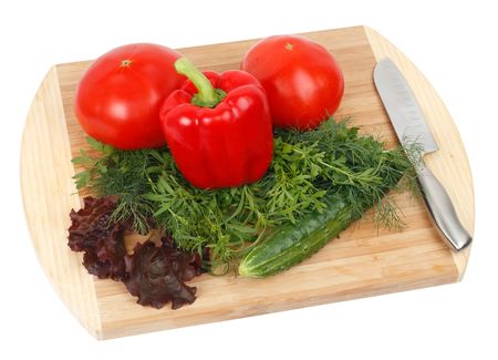 Ingredients for vegetable salad on the board. Isolated on white backgroundの写真素材