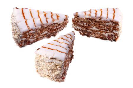 Three Slices of cake isolated on white backgroundの写真素材
