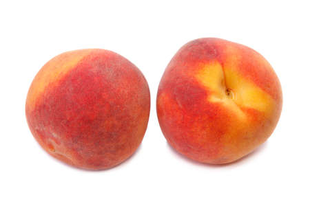 Two peach isolated on a white backgroundの写真素材