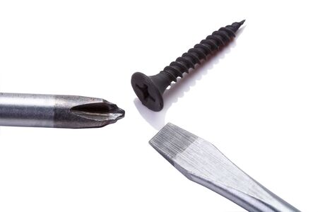 Screwdrivers and Wood Screw isolated on white backgroundの写真素材