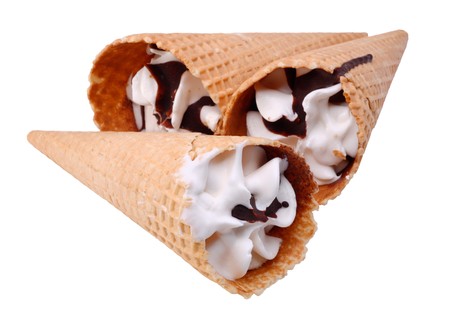 Three Ice-cream with chocolate in waffle cup on a white background.の写真素材