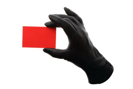 Red card with black leather gloves isolated on white background.の写真素材