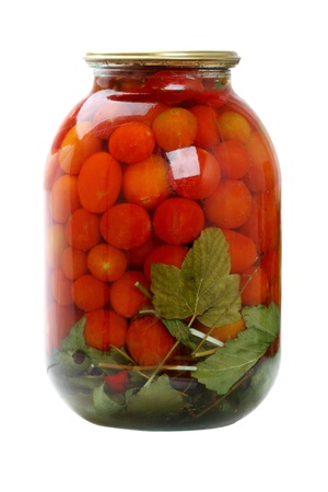 A glass jar of canned cherry tomatoes on white background. Series of canned foodsの写真素材