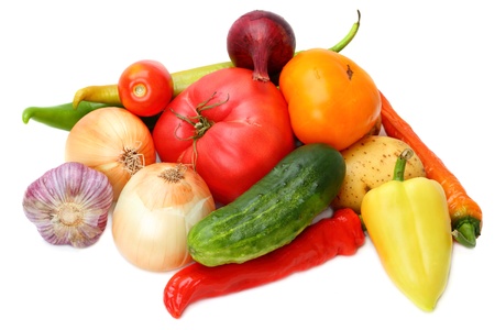 Heap fresh vegetables isolated on white backgroundの写真素材