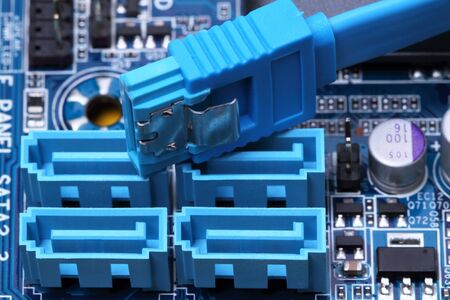 Circuit board with connectors SATA on computerの写真素材