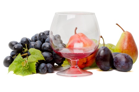 Ripe fruit and red wine isolated on white backgroundの写真素材