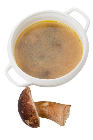A bowl of mushroom soup and frozen mushroom. Isolated on white backgroundの写真素材