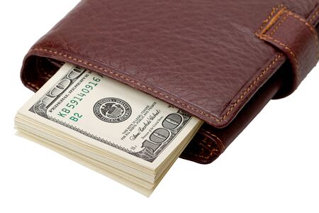 Leather wallet brown color with dollars. Isolated on white backgroundの写真素材