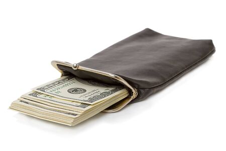 Long purse with a stack of $100 dollar bills. Isolated on white backgroundの写真素材