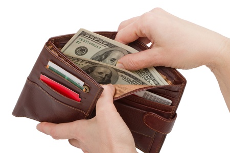 Hands got dollars from his wallet. Isolated on white backgroundの写真素材