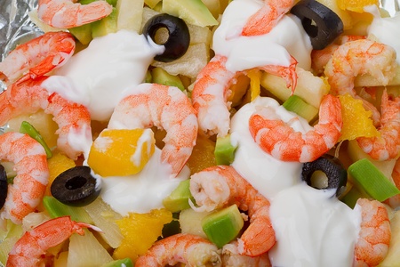 Salad with shrimp, pineapple, mango, avocado, olives and mayonnaiseの写真素材