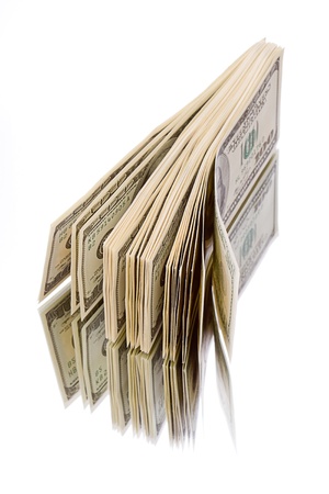 Stack of $100 dollar bills. Isolated on white backgroundの写真素材