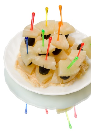 Canapes with pineapple, olives, cheese and garlic sauceの写真素材