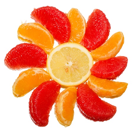 Slices of citrus fruits isolated on white backgroundの写真素材