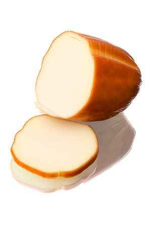 Smoked cheese isolated on white backgroundの写真素材