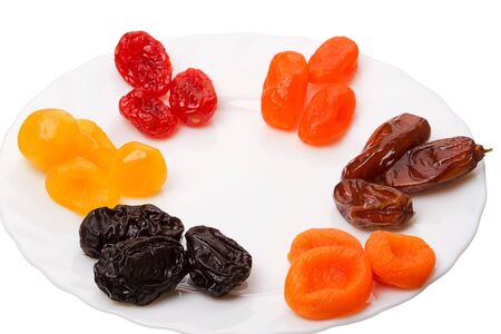 Six kinds of Dried fruit - prunes, apricots, figs, dogwood and date.の写真素材