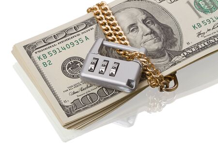 Financial security concept - padlock and dollars. Isolated on white backgroundの写真素材