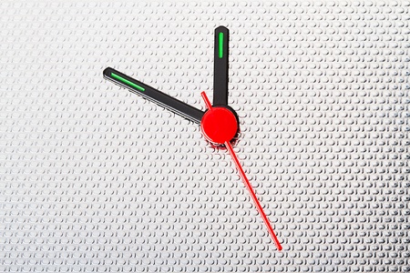 Clock hands on corrugated stainless steel. Copy spaceの写真素材