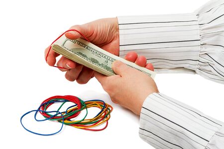 Multicolored rubber bands for tying dollars. Isolated on white backgroundの写真素材