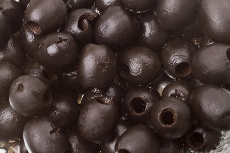 Background of black olives canned. Series of canned foodsの写真素材