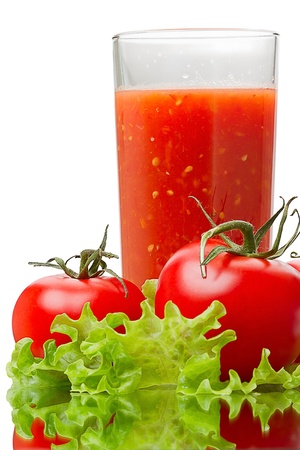 Tomato juice and tomatoes on a salad isolated on white backgroundの写真素材