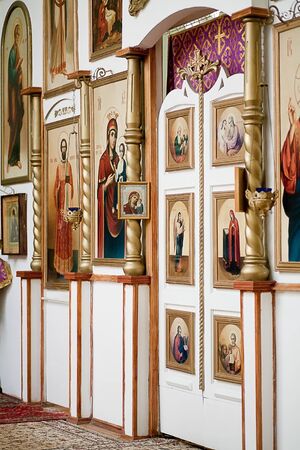 The icons and the altar of a small orthodox churchの写真素材