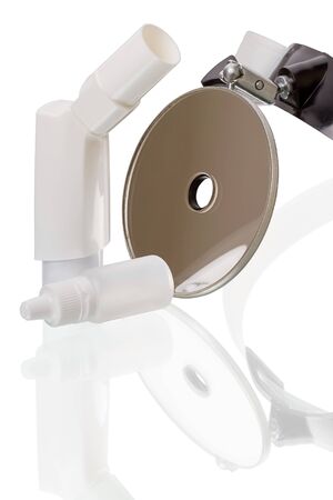 Inhaler and head mirror isolated on white backgroundの写真素材