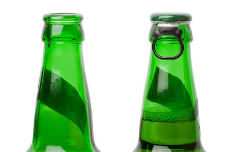 Open and closed beer bottles. Isolated on white backgroundの写真素材