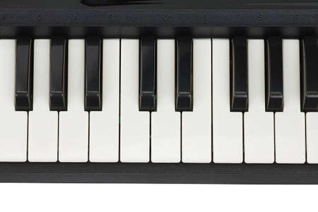 Top view of shiny synth keys on a white background.の写真素材