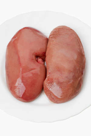 Animal Kidney (product) on white plateの写真素材