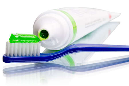 Toothbrush and toothpaste in a tube isolated on white backgroundの写真素材
