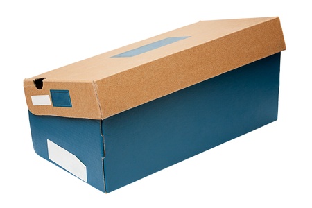 Shoe box made of rough paper and card. Concepts of recycling, re-use of objects, frugality, shopping. Add your own copy. Isolated on white backgroundの写真素材