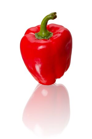 Red bell pepper with reflection isolated on white backgroundの写真素材