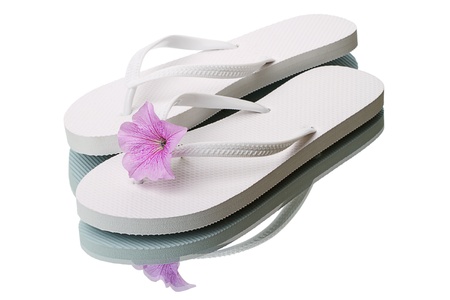 Sandals and flower isolated on white backgroundの写真素材