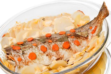 Baked pollack fish with potatoes and vegetablesの写真素材