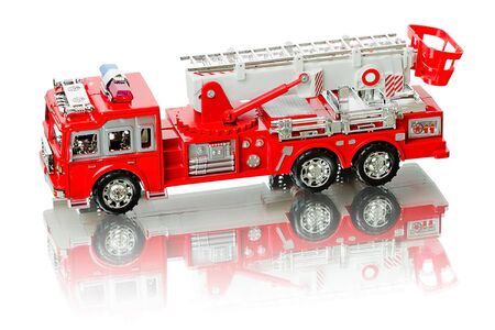 Miniature fire truck isolated on a white backgroundの写真素材