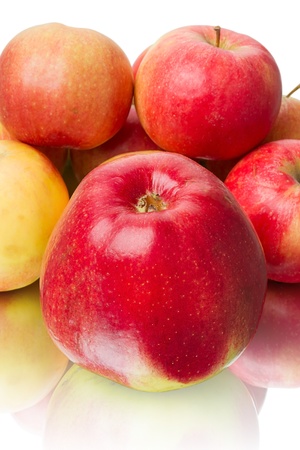 Heap of red apples isolated on white backgroundの写真素材