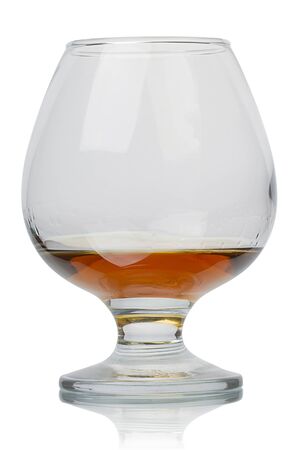 Cognac  brandy  glass isolated on white backgroundの写真素材
