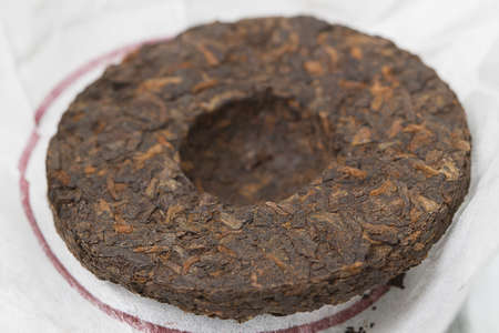 RAW pressed Puer tea, a small bowlの写真素材