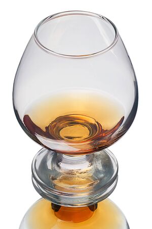 Cognac (brandy) glass isolated on white backgroundの写真素材